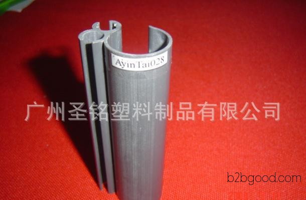 Various plastic building materials: PVC profiles, PVC foam profiles, environmentally friendly gray PVC profiles.