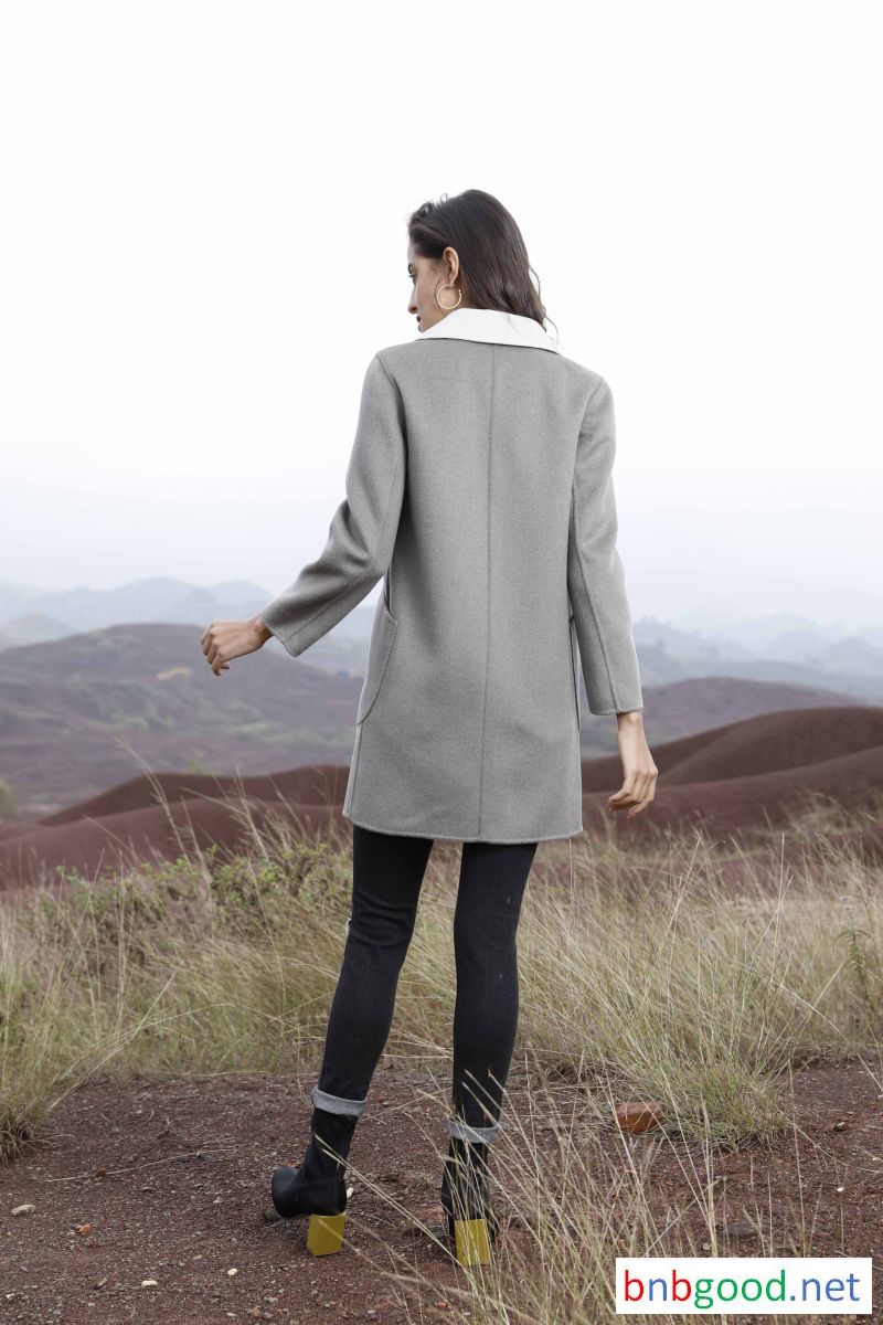 Inside is white, black outside, women's half coat